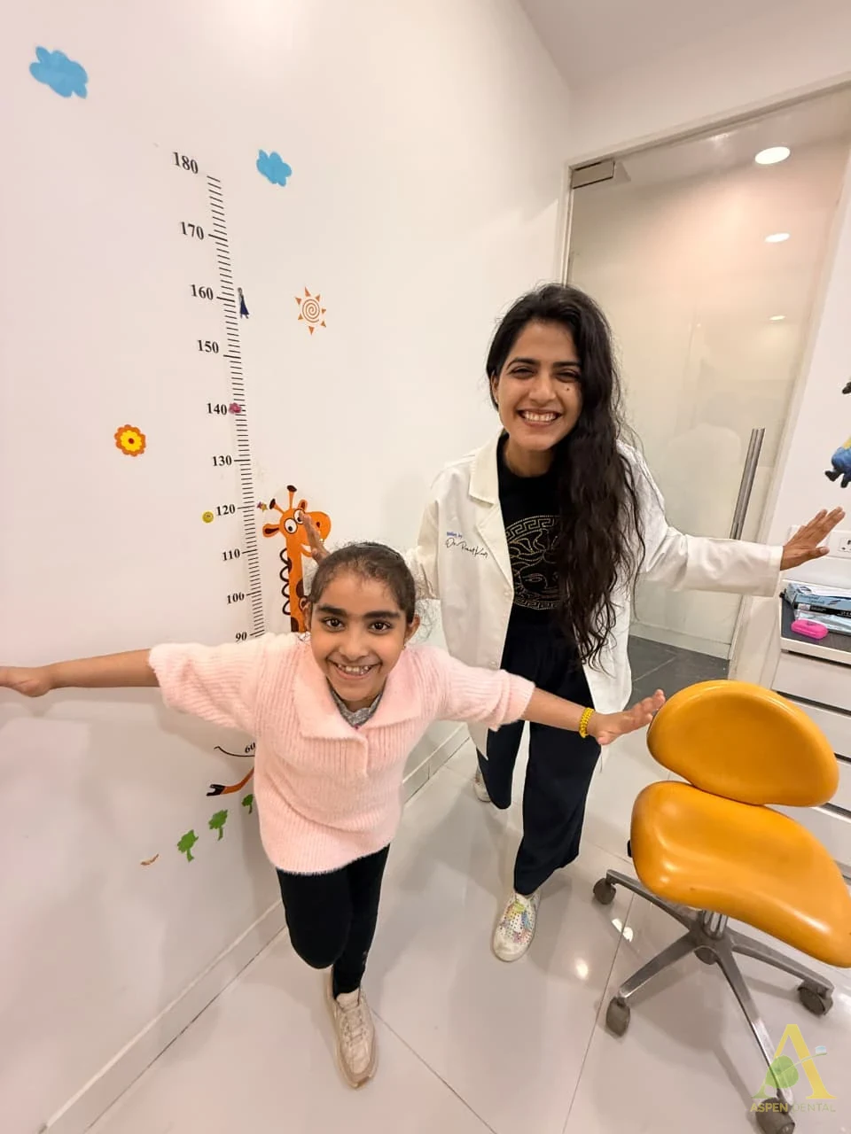 Doctor with child Aspen Dentals