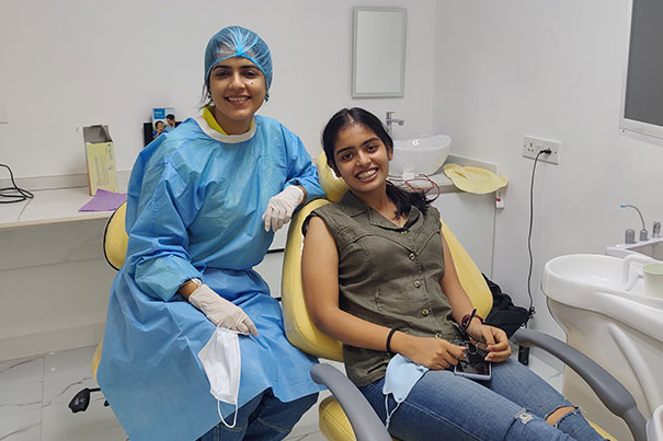 Child with brushing chart at Aspen Dentals